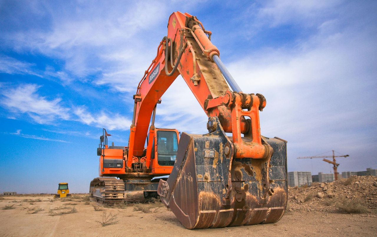 close up of a orange excavator